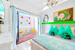 a childs bedroom with a room with a large window at D- Hip NoHo Haven Hot Tub - Family - Parking in North Hollywood