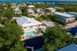 an aerial view of a house with a pool at Casa de Sueno in Summerland Key