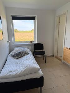 Postel nebo postele na pokoji v ubytování Guesthouse Hune