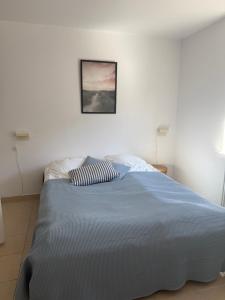 Postel nebo postele na pokoji v ubytování Guesthouse Hune