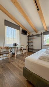 Ένα ή περισσότερα κρεβάτια σε δωμάτιο στο Agriturismo Pietra Sorgente