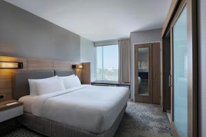 Postel nebo postele na pokoji v ubytování SpringHill Suites by Marriott Austin Cedar Park