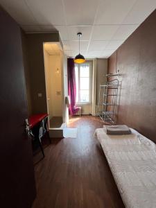 Postel nebo postele na pokoji v ubytování Hotel d Enghien