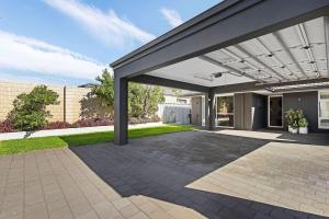 a patio of a home with awning at Bayswater Retreat, 3 Bed house. in Perth