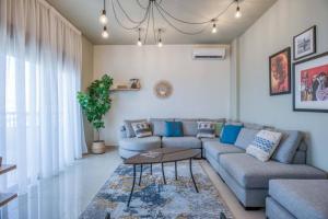 Setusvæði á Vinyl 3-Bedroom Apartment in Zouk Mikael