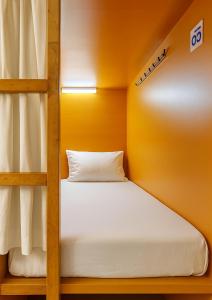 Classic Capsule Holiday Homes客房内的一张或多张床位