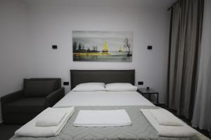 Postel nebo postele na pokoji v ubytování Neranxi Apartament