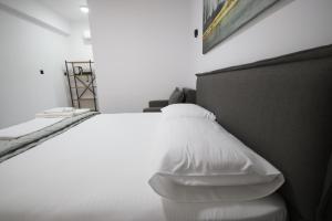 Postel nebo postele na pokoji v ubytování Neranxi Apartament