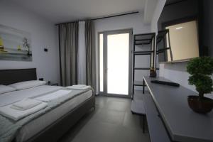 Postel nebo postele na pokoji v ubytování Neranxi Apartament