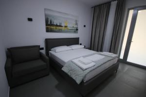 Postel nebo postele na pokoji v ubytování Neranxi Apartament
