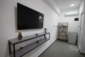 TV a/nebo společenská místnost v ubytování Neranxi Apartament