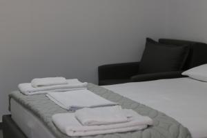 Postel nebo postele na pokoji v ubytování Neranxi Apartament