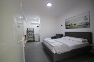 Postel nebo postele na pokoji v ubytování Neranxi Apartament