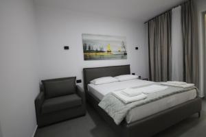 Postel nebo postele na pokoji v ubytování Neranxi Apartament