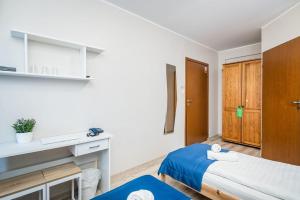 Posteľ alebo postele v izbe v ubytovaní Hotel Nowa Panorama