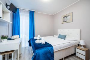 Posteľ alebo postele v izbe v ubytovaní Hotel Nowa Panorama