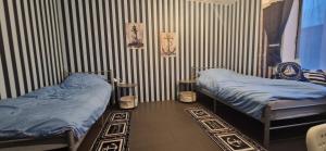 Voodi või voodid majutusasutuse Good Vibes HOSTEL toas