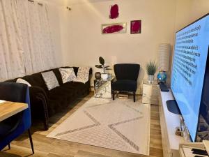 Μια τηλεόραση ή/και κέντρο ψυχαγωγίας στο Home in Cambridge