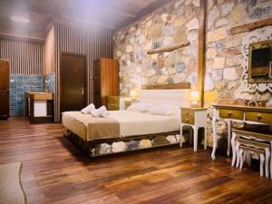 Postel nebo postele na pokoji v ubytování Ataviros Hotel + 37 fotografií