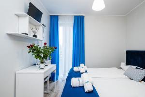 Posteľ alebo postele v izbe v ubytovaní Hotel Nowa Panorama