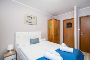 Posteľ alebo postele v izbe v ubytovaní Hotel Nowa Panorama