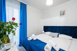 Posteľ alebo postele v izbe v ubytovaní Hotel Nowa Panorama