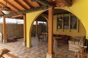 Χώρος καθιστικού στο Habitación con Baño privado