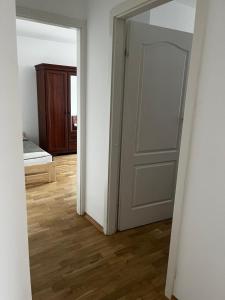 Posteľ alebo postele v izbe v ubytovaní Apartamenty Centrum