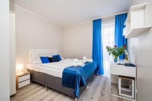 Posteľ alebo postele v izbe v ubytovaní Hotel Nowa Panorama