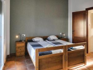 A bed or beds in a room at Holiday Home in Arenas with Private Pool