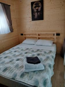 Postel nebo postele na pokoji v ubytování BayKus Guesthouse-Konukevi