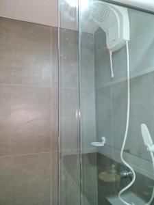Bilik mandi di Loft confortável com garden