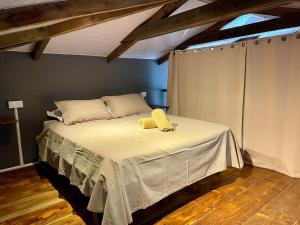 Postel nebo postele na pokoji v ubytování Fare Raniarii