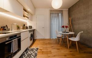 Η κουζίνα ή μικρή κουζίνα στο Cosy Urban Studio - Unbeatable Central Location! +5 φωτογραφίες