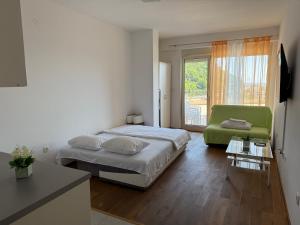 Postel nebo postele na pokoji v ubytování Lux Apartment Vidovic