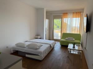 Postel nebo postele na pokoji v ubytování Lux Apartment Vidovic