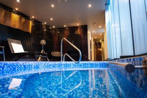 Bazén v ubytování Ladera Boutique Hotel nebo v jeho okolí