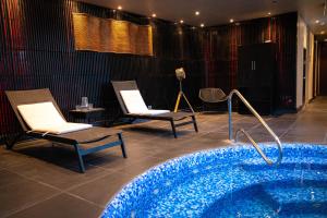 Bazén v ubytování Ladera Boutique Hotel nebo v jeho okolí