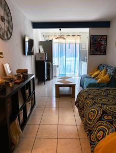 Ένα ή περισσότερα κρεβάτια σε δωμάτιο στο Studio cosy sur le port