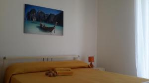 Posteľ alebo postele v izbe v ubytovaní Casa Aurora