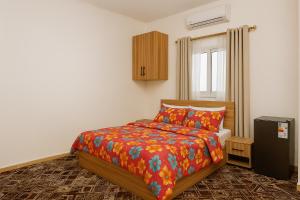 Chambre meublée à Ngor dans une zone calme et accessible客房内的一张或多张床位