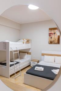 Cama o camas de una habitación en Hotel Milo Ksamil
