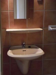 Kúpeľňa v ubytovaní Apartman Nóra