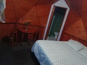 Postel nebo postele na pokoji v ubytování Glampin la esperanza