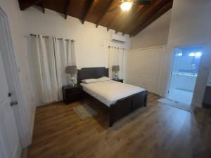 Een bed of bedden in een kamer bij Itopia