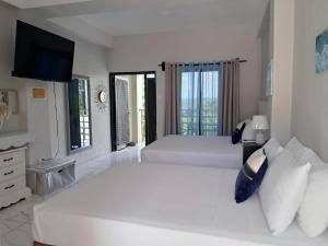 Katil atau katil-katil dalam bilik di MisBHaven Resort and Spa