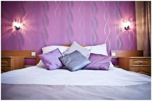 Postel nebo postele na pokoji v ubytování Hotel U Grubego