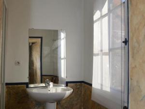 a bathroom with a sink and a mirror at Château Directoire avec Piscine Privée et Jardin - FR-1-381-485 in Châtillon-sur-Indre +24 photos