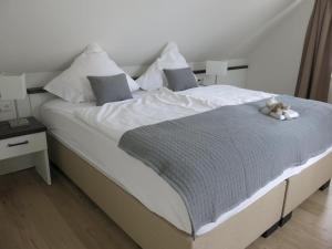 Postel nebo postele na pokoji v ubytování Apartmenthuus König