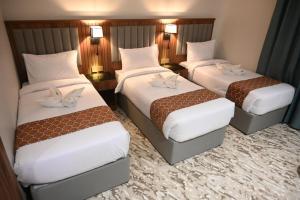 Gambar di galeri bagi فندق غالب الروضة شركة غالب تورز di Mekah